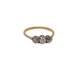 An antique 18ct gold three stone diamond ring, size O CONDITION REPORT: 1.