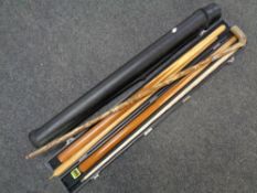 A vintage walking stick together with two snooker cues in cases