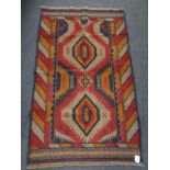 A Baluchi rug 140cm by 87cm