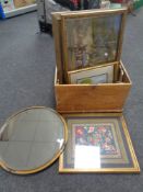 An antique pine box containing assorted pictures, a circular framed bevel edged mirror,