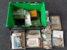 A crate containing cigarette tins and boxes containing on hundreds of loose antique and later world