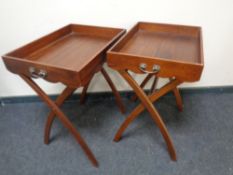 A pair of reproduction butlers trays on stands.
