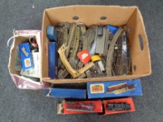 A box containing Hornby railways rolling stock, track and accessories including a 6917 LMS engine.