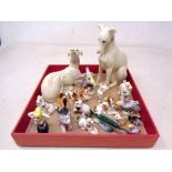 A box containing a collection of miniature ceramic animal ornaments together with two further Lenox