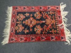 An Iranian Hamadan rug.