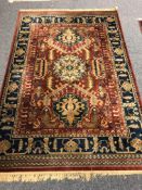 A machined Persian design rug 160 cm x 240 cm