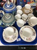 A tray containing two Jasperware teapots,