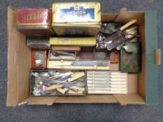 A box of vintage tins, wooden cigar box,