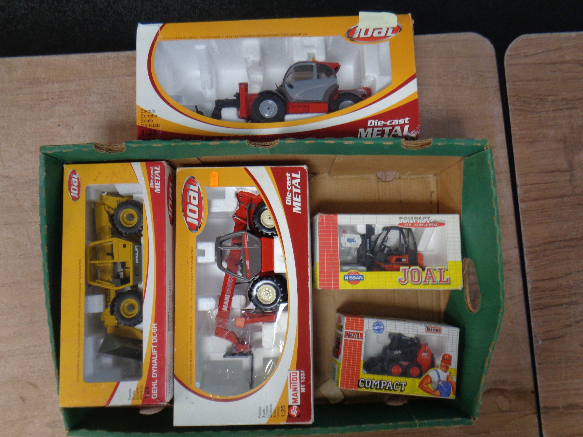 A box containing five Joal die cast construction vehicles (boxed).