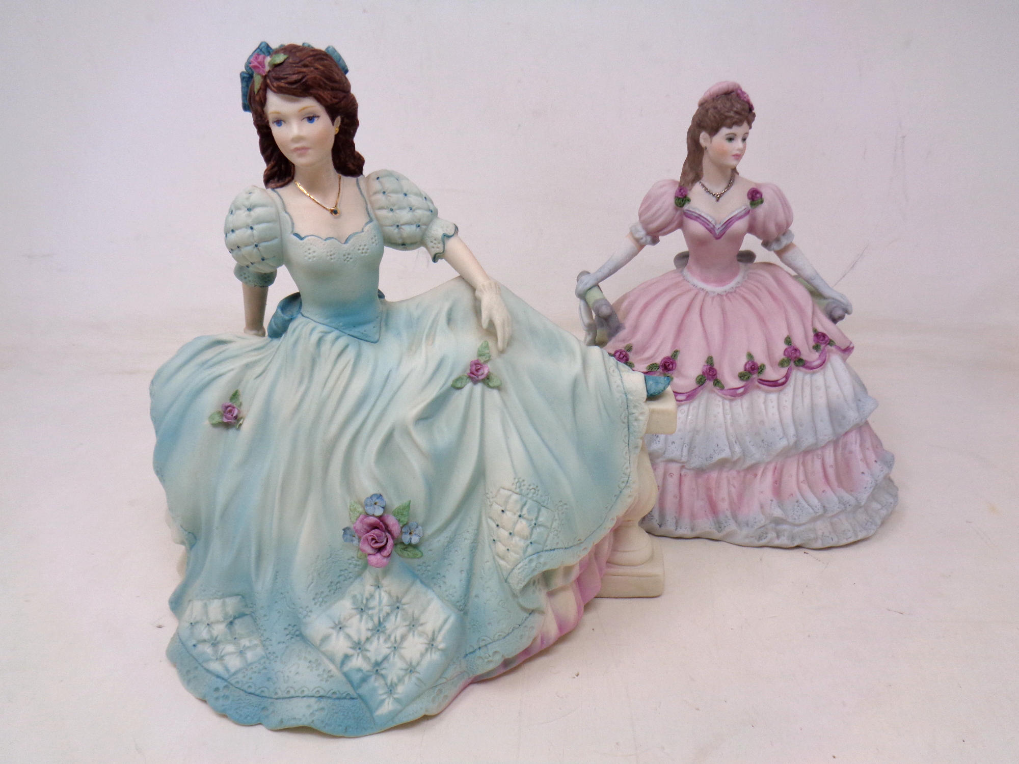 Two Coalport Age of Elegance figures, Royal Gala and On the Balcony.
