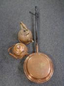 Two vintage copper kettles together with a copper wooden handled bed warming pan