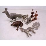 A box containing assorted metal animal figures.