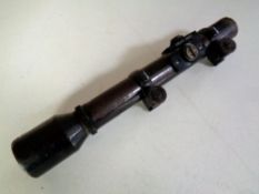 A German Ajack 2.5 x 70 rifle scope.