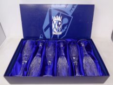 A boxed set of six St. Andrew's Crystal champagne flutes.