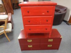 A painted three drawer chest and a campaign style four drawer chest with brass drop handles