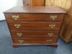 A George III oak chest of four drawers