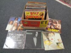 A box containing vinyl LPs and 12" singles including Ian Dury, Genesis, Fleetwood Mac,