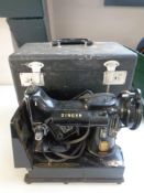 A 20th century Singer 222k sewing machine (electrified) in case.