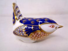 A Royal Crown Derby china paperweight of a Wren with gold stopper.
