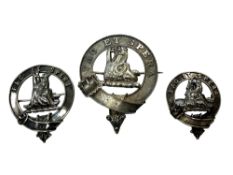 Three antique silver clan badges marked Fac et Spera ('Do and Hope')