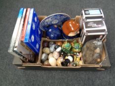 A box containing polished stone eggs, Tetley teapot and storage jar, Müller rice bears etc.