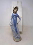 A Nao figure - Lady in Victorian dress, boxed.