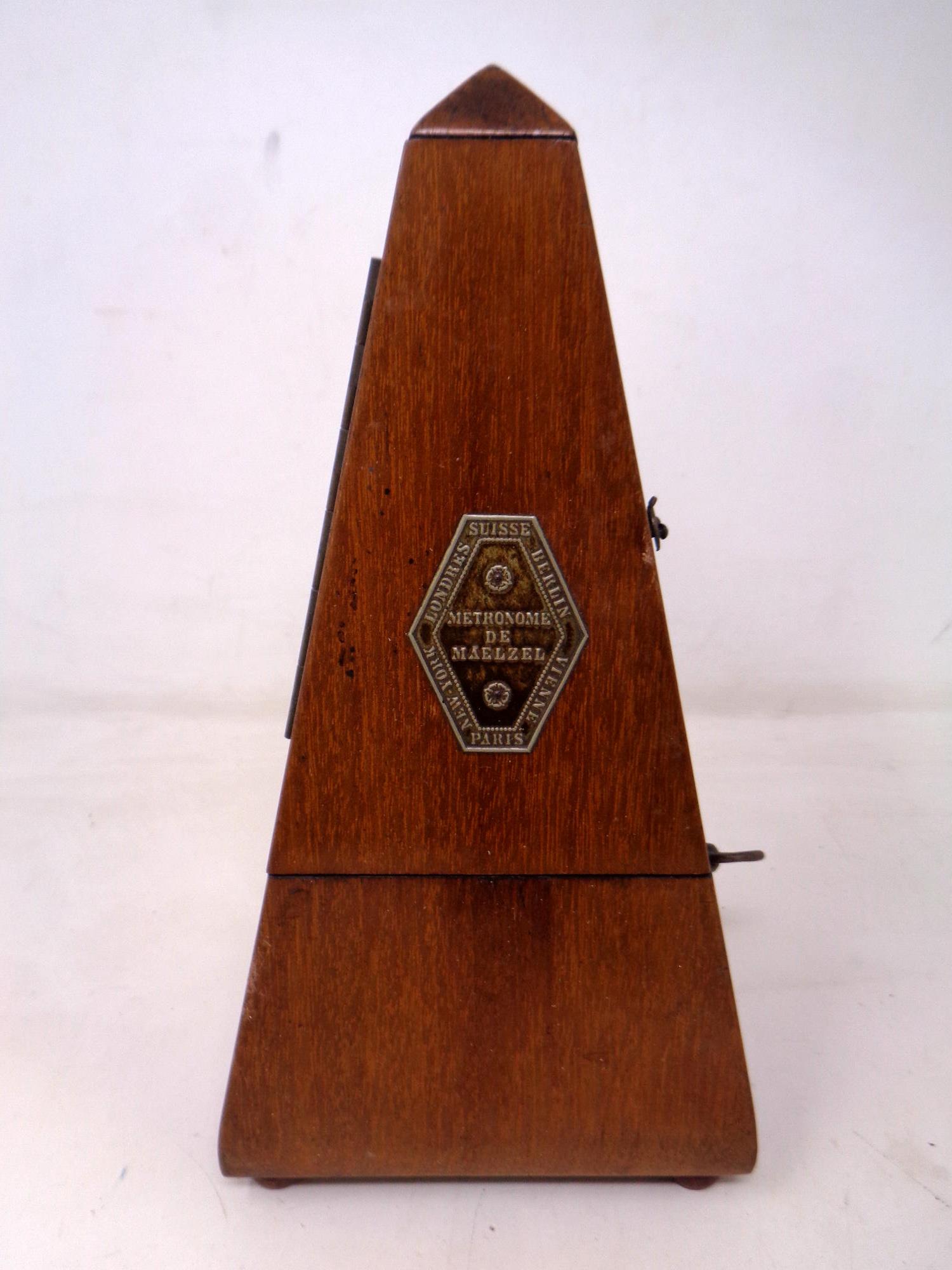 A mahogany cased Metronome De Maelzel.