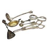 A group of silver and other items including caddy spoon, strainer, salt,