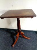 A 19th century tripod table