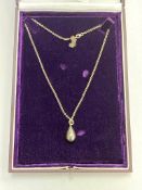 A Mappin and Webb silver necklace with egg drop pendant, in original retail box.