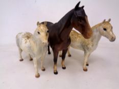 Two Beswick Connemara horse figures together with a further horse figure (as found).