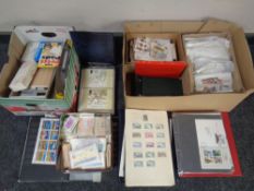 Three boxes containing a quantity of loose stamps, stamp albums, postcard albums etc.