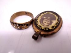 A 9 carat gold lady's Mourning ring together with a locket.