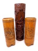 Three carved bamboo brush pots.