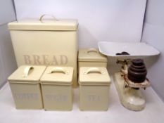 A set of vintage kitchen scales with weights together with a contemporary five piece kitchen bread