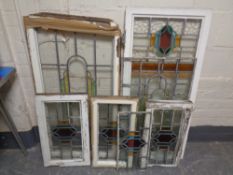 Seven antique stained leaded glass windows.