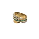An 18ct gold emerald and diamond ring, size N CONDITION REPORT: 11.