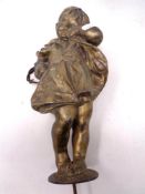 A painted spelter figure of a girl,