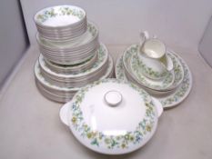 Thirty six pieces of Royal Doulton Ainsdale bone china dinner ware
