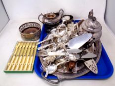 A tray containing assorted plated wares including a three piece tea service, a wine coaster,