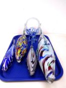 A tray of four Murano glass fish ornaments together with a further Venetian glass basket