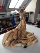 An Italian ceramic figure group, Giraffe with calf.