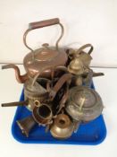 A tray containing antique and later copper and brass ware including kettles, eastern teapots,