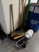 Two rubber mallets together with a quantity of assorted garden tools, handsaws, sprayer etc.