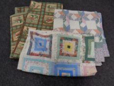 A patchwork throw together with a further hand stitched quilt and a tapestry quilt depicting ducks.