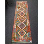 A Chobi kilim runner 200cm by 62cm