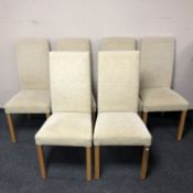 A set of six Marks & Spencers furniture high back dining chairs upholstered in beige fabric.