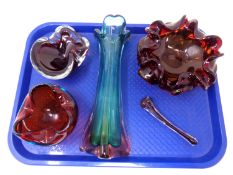 A tray containing four pieces of art glass including, a vase, two bowls and a mortar and pestle.