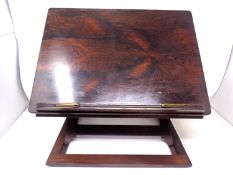 A rosewood reading stand.