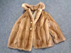A lady's mink fur jacket.